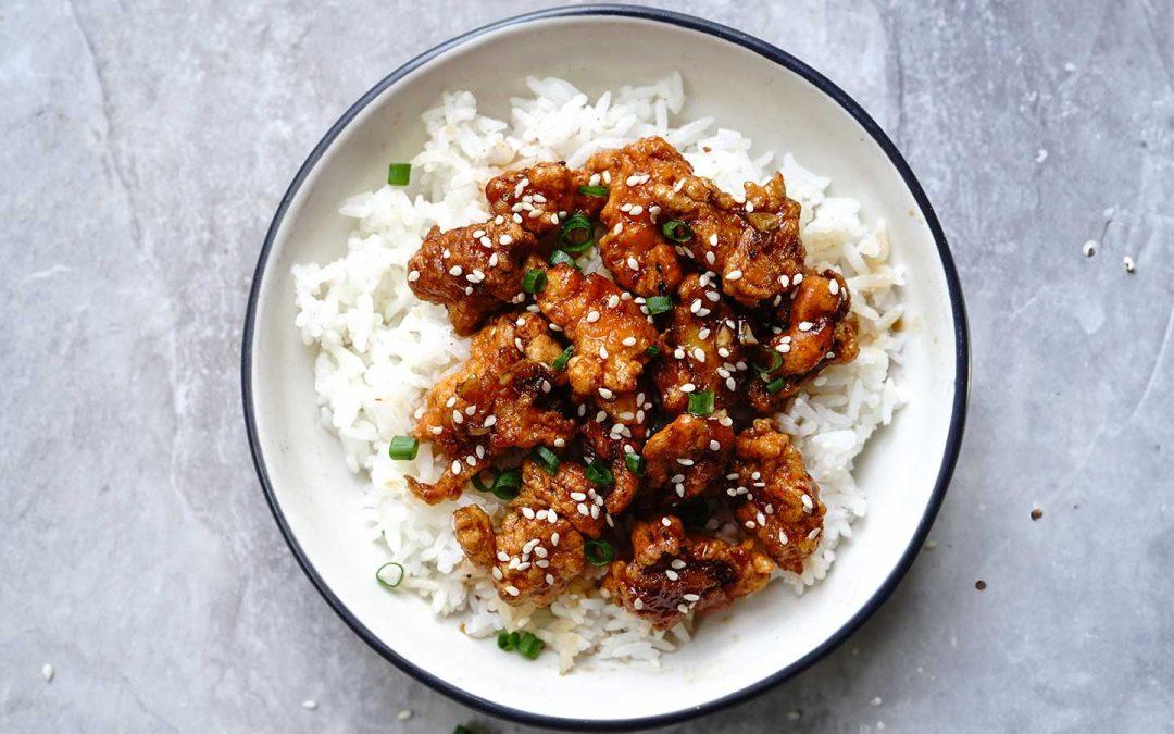 Chicken cubes in honey and ginger sauce with coriander rice